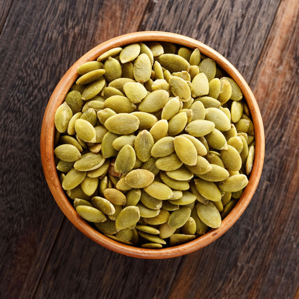 Assorted legumes and grains: chickpeas, split peas, lentils, and quinoa.